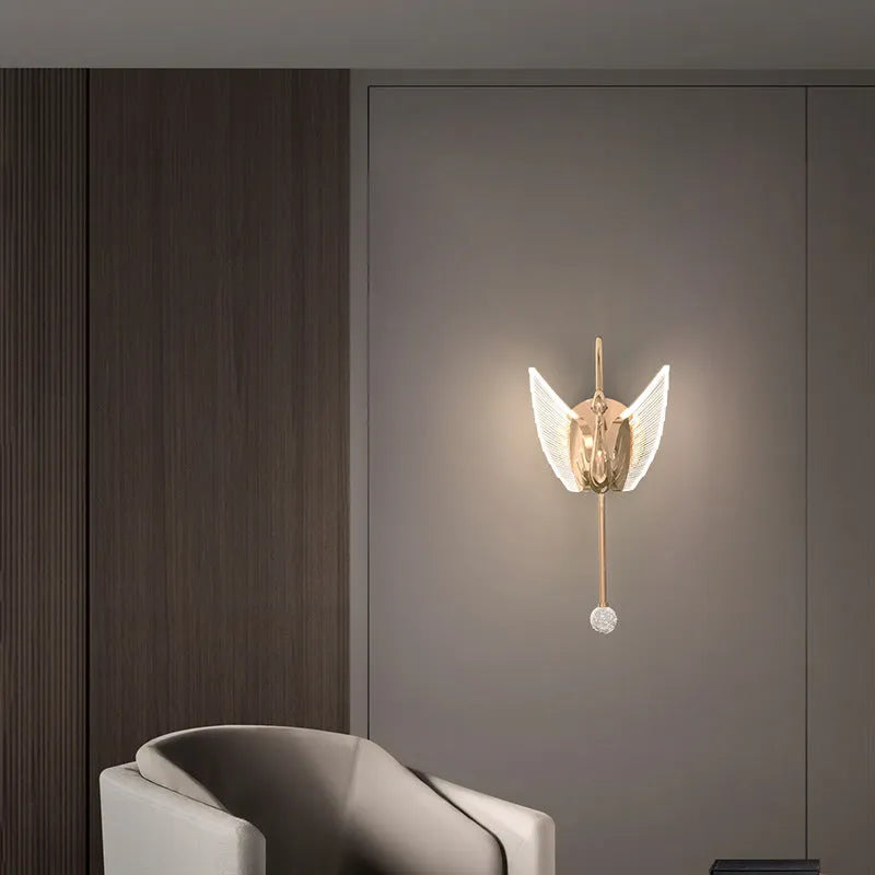 Gold modern minimalist swan-shaped wall lamp with acrylic shade and iron construction