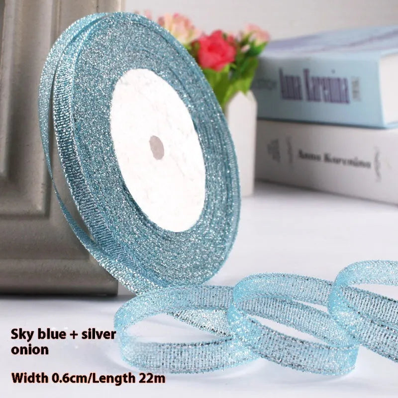 Roll of polyester gift packaging ribbon with 0.6cm width and 22 metre length in various colour options
