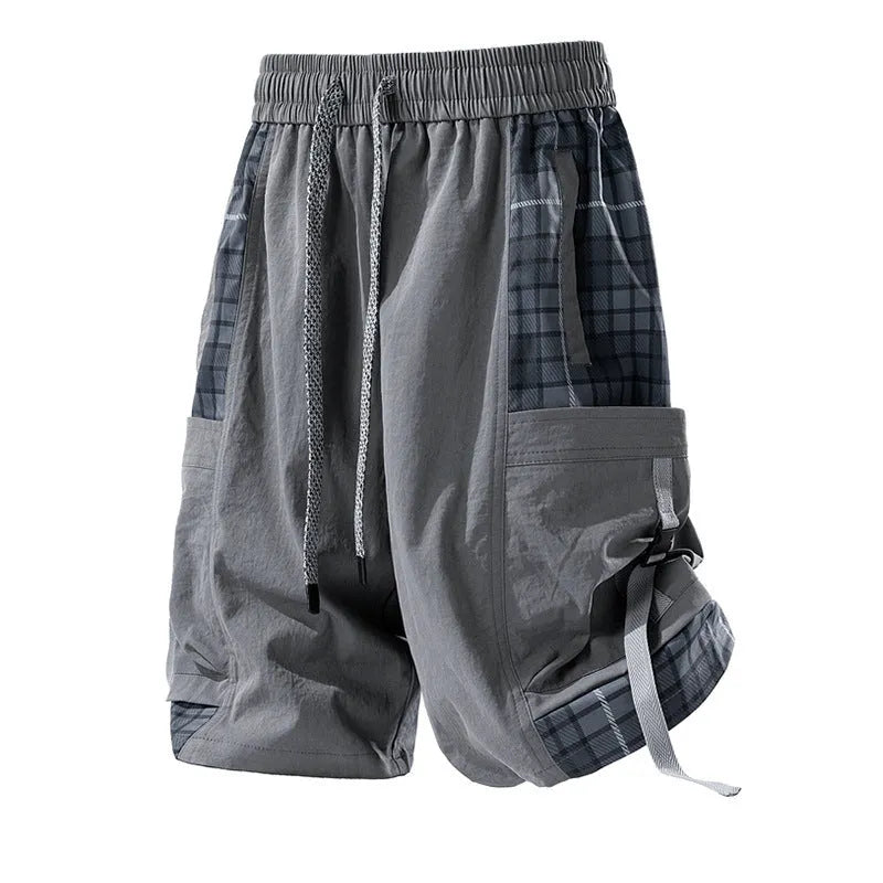 Men's loose fit cargo shorts with plaid stitching detail in black, light grey, and smoky grey.
