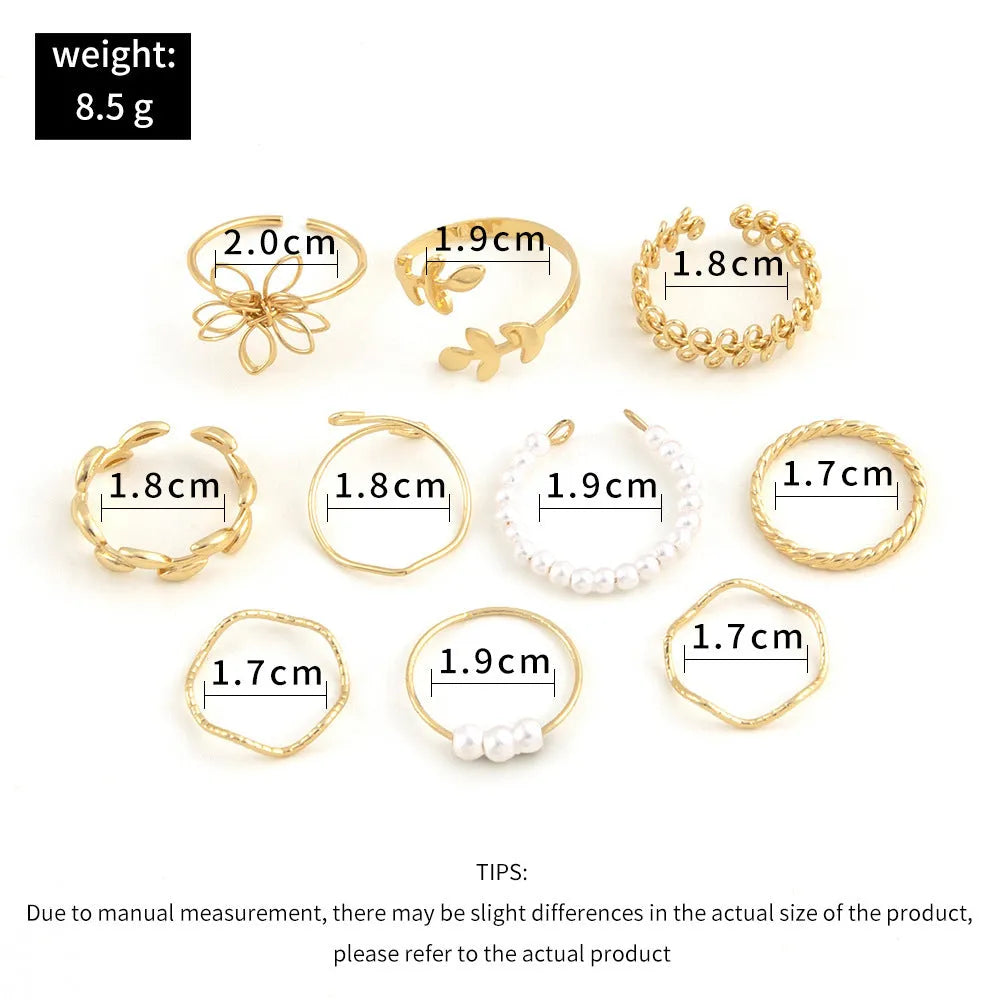 Gold coloured openwork flower shape alloy ring with a glossy electroplated finish.