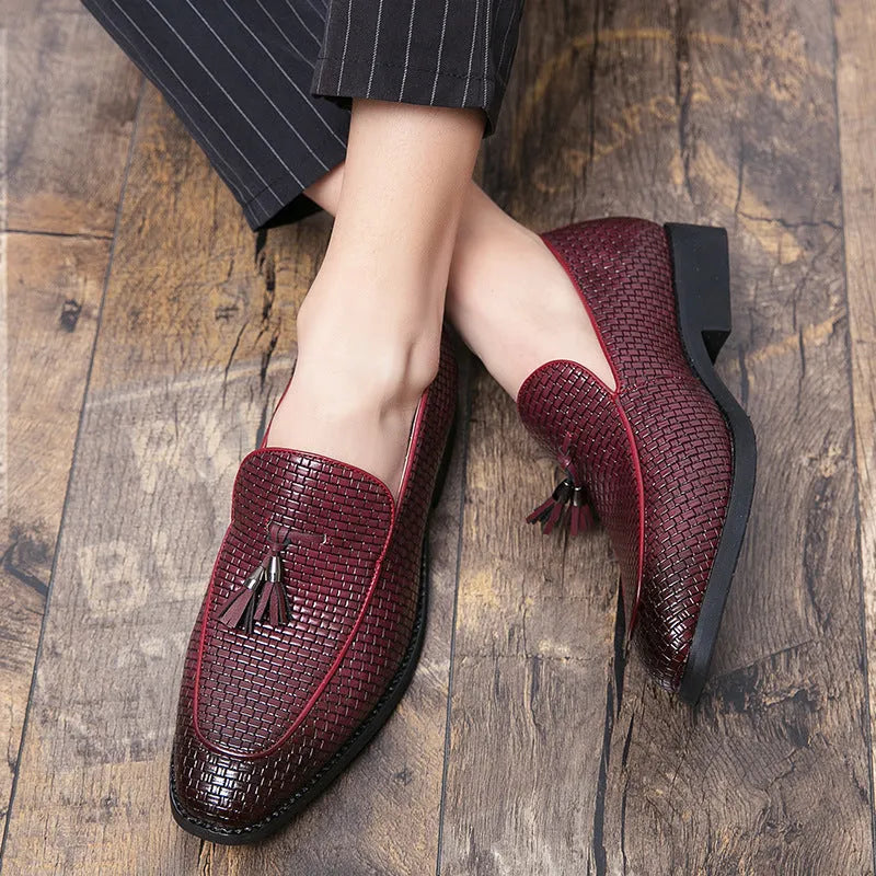 Men's black pointed toe slip-on business shoes with tassel detail