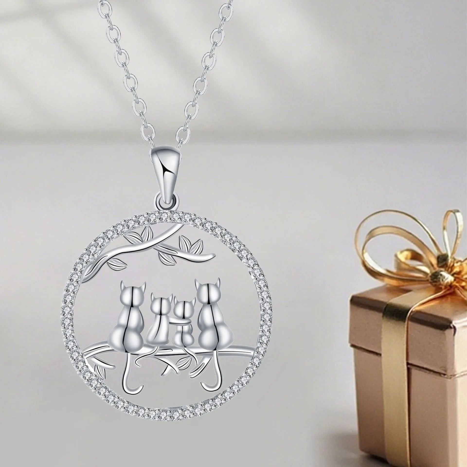 Original design four kitten copper pendant necklace with a cross chain style.