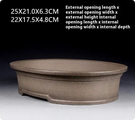 Handmade antique oval purple sand bonsai flower pot measuring 25x21x6.3cm