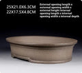 Handmade antique oval purple sand bonsai flower pot measuring 25x21x6.3cm