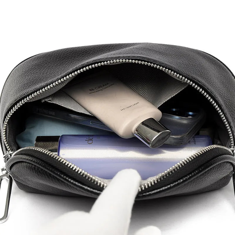 Women's soft PU leather messenger bag in saddle shape with cross-body strap and zipper pocket.