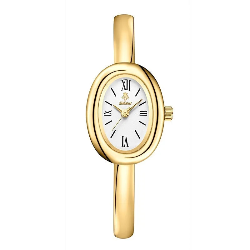 Women's oval retro quartz watch in gold colour with spiral pattern dial, showing 8mm thickness