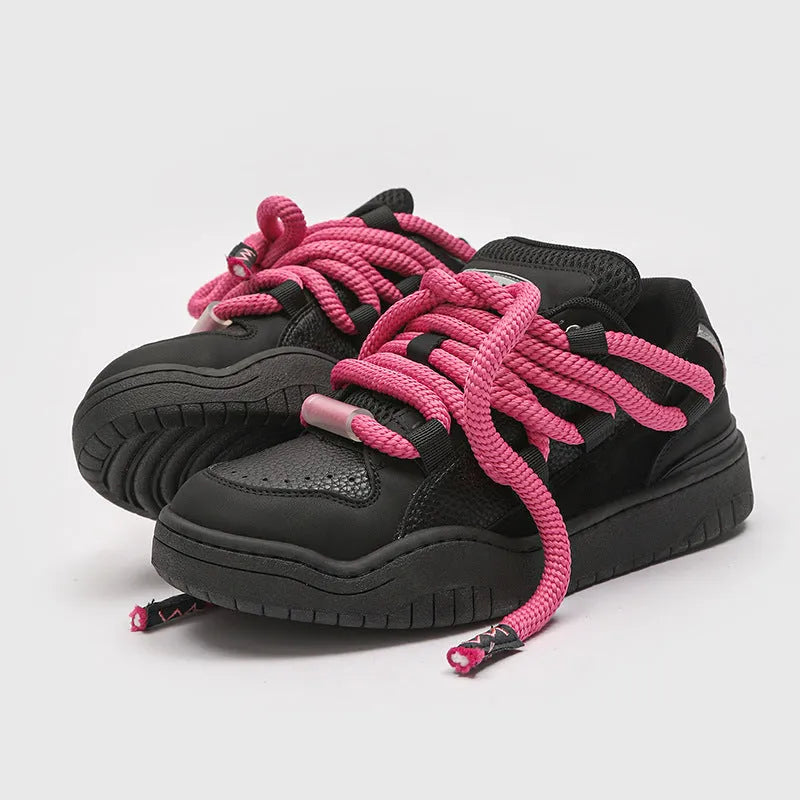 Unisex casual lace-up shoes with thick rubber soles in denim blue colour showing round toe and low-top design