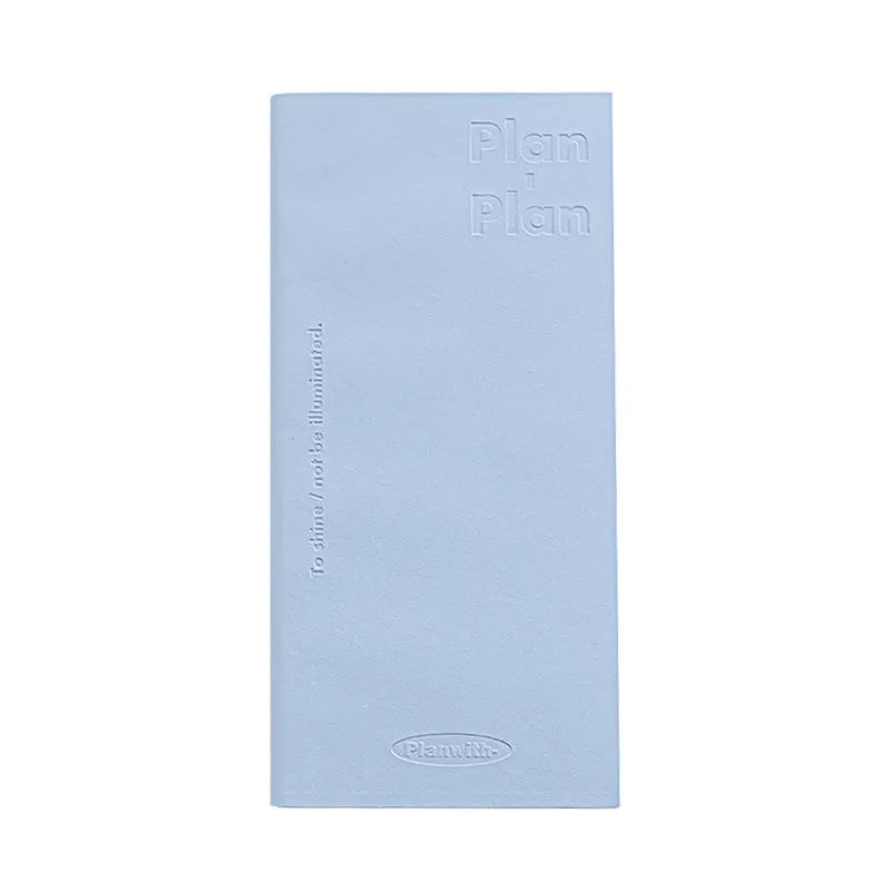 A5 embossed meter notebook open on a desk, showing white 100gsm paper and a choice of five cover colours.