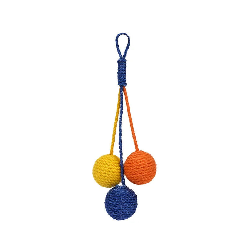 Bite-resistant cat teaser stick with wire core and three attached colourful catnip balls.