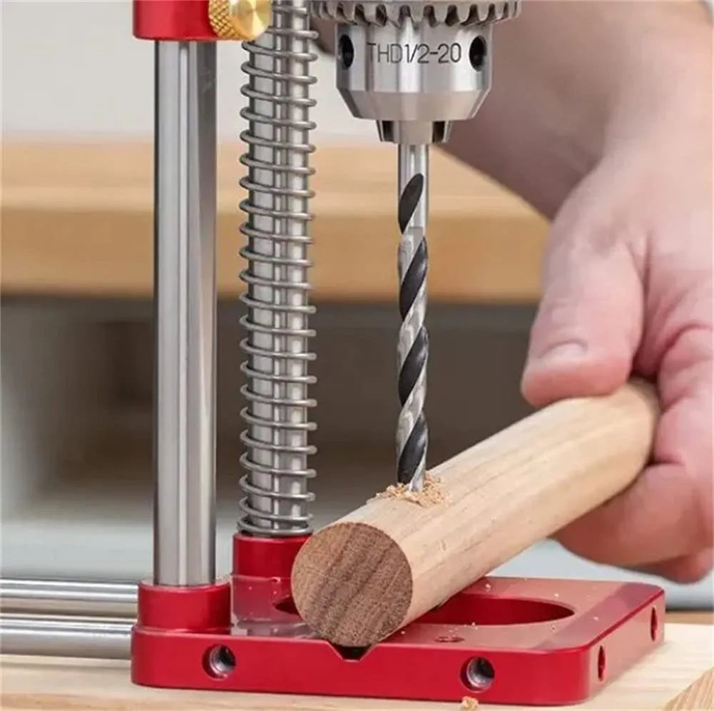 Woodworking drill locator with metal body and red or black durable polymer section for wood drilling