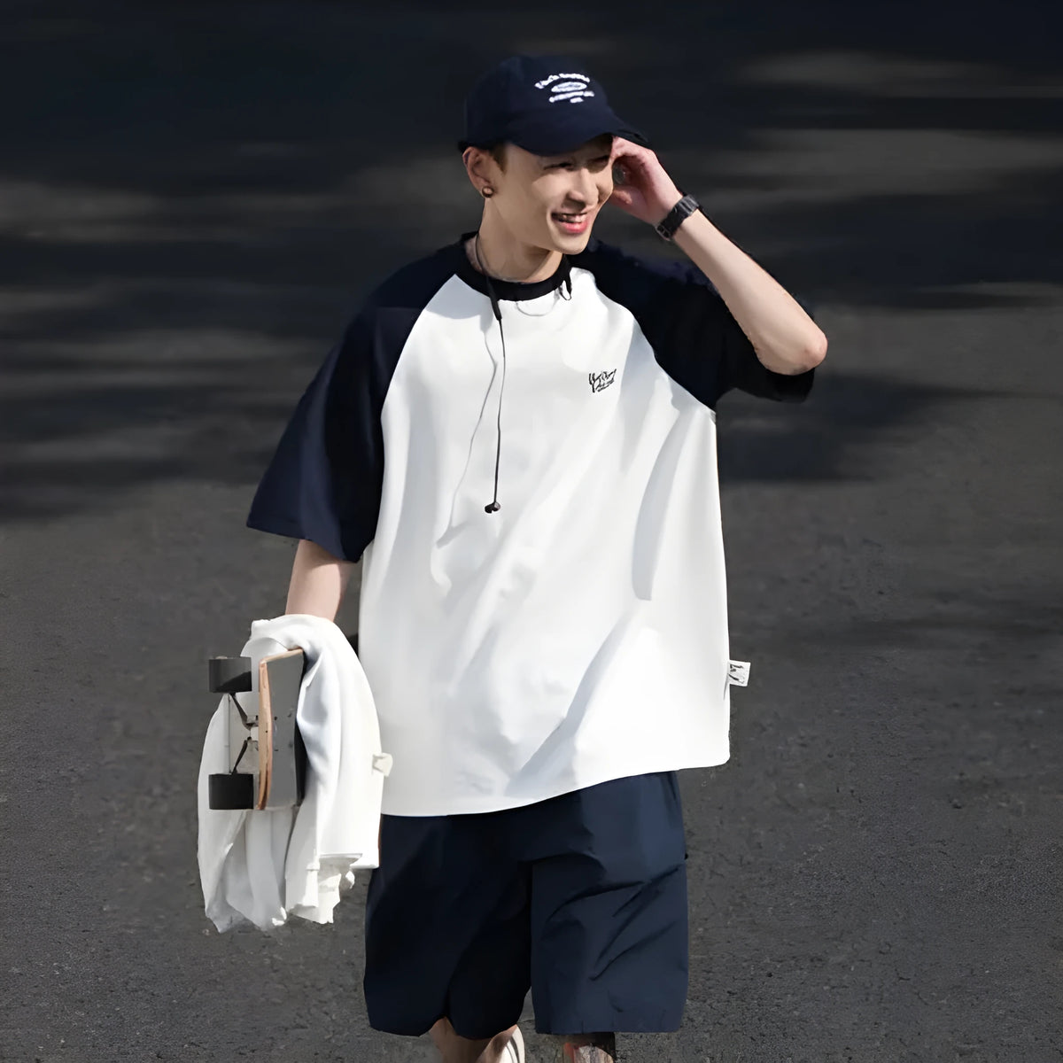 Blue Japanese-style loose men's t-shirt with raglan sleeves on a hanger