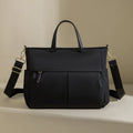 Women's Oxford cloth laptop briefcase in elegant black colour with open pockets and contrast stitching