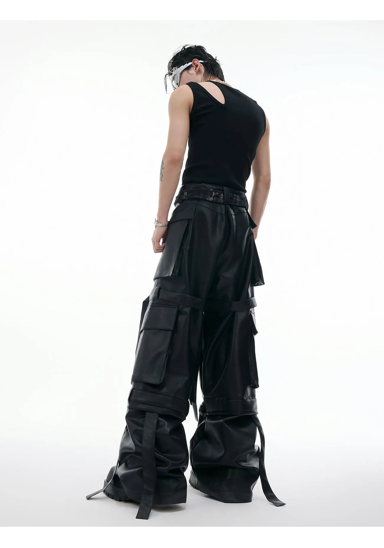 Black retro loose-fit multi-pocket trousers with quilted stitching detail, showing front and side views.