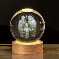White crystal ball desk ornament on solid wood base with inner paper purity scenes