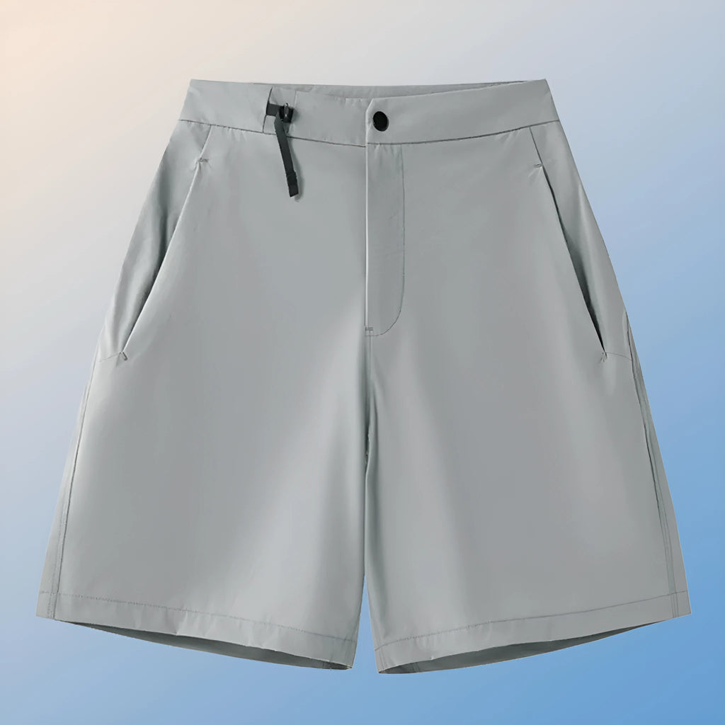 Man wearing khaki quick-drying sports shorts with an elastic waistband for running or climbing.