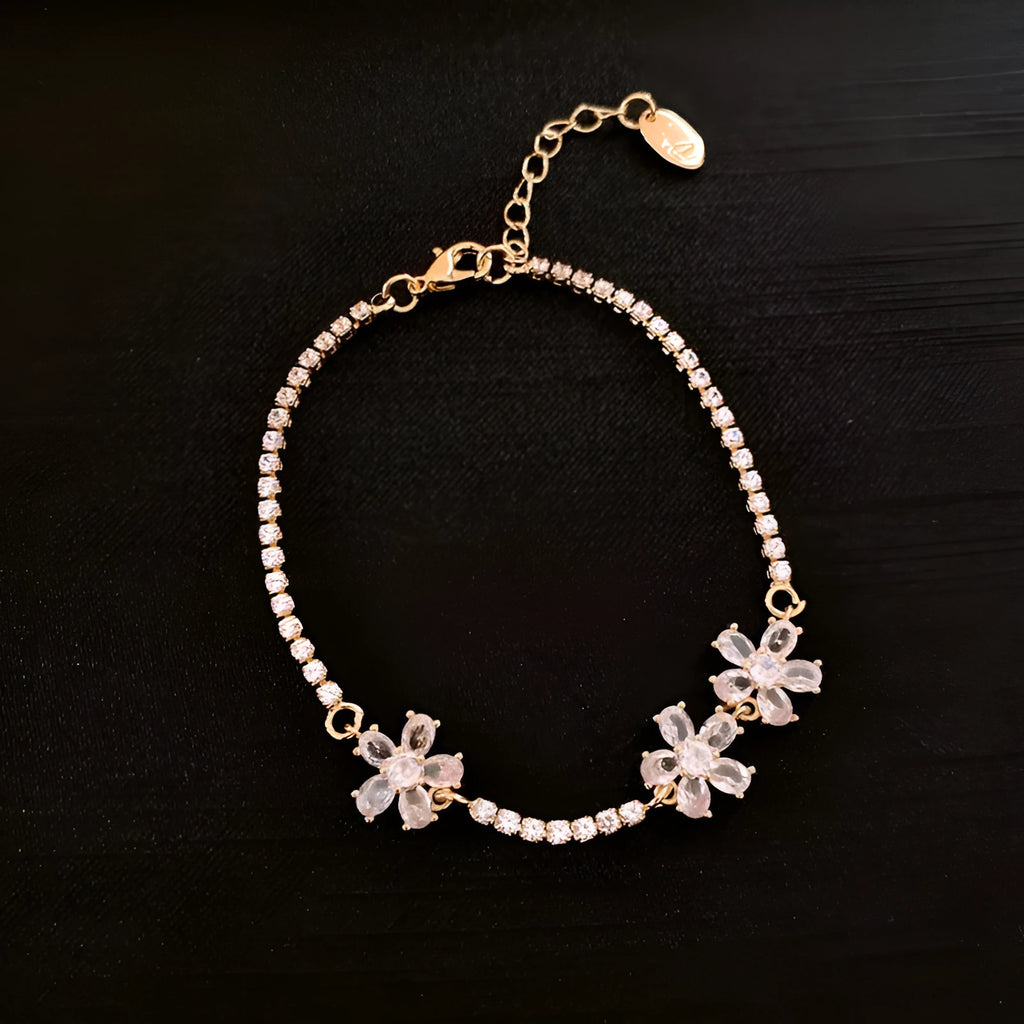 Gold-tone copper bracelet with geometric shapes and zircon stone detailing for women's fashion