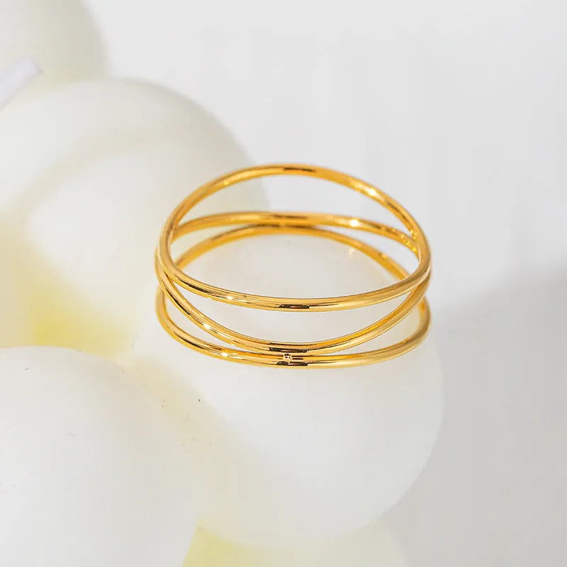 Gold titanium steel ring with three-layer coil geometric design