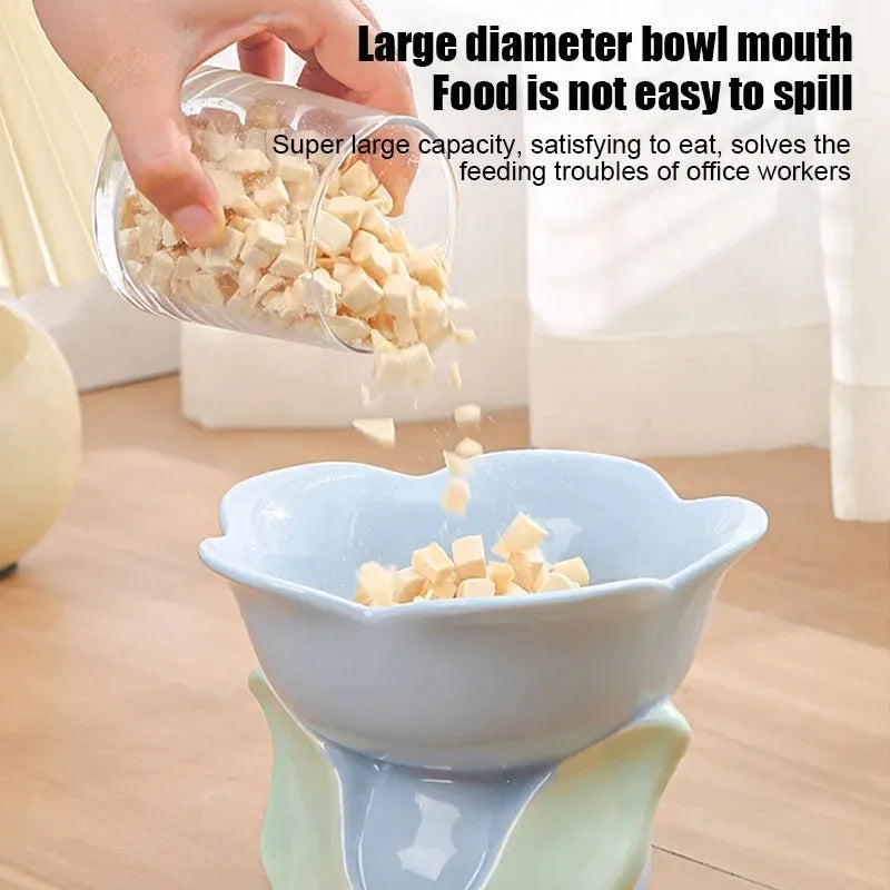 Blue ceramic pet bowl with floral pattern and elevated non-slip design for cats and small dogs