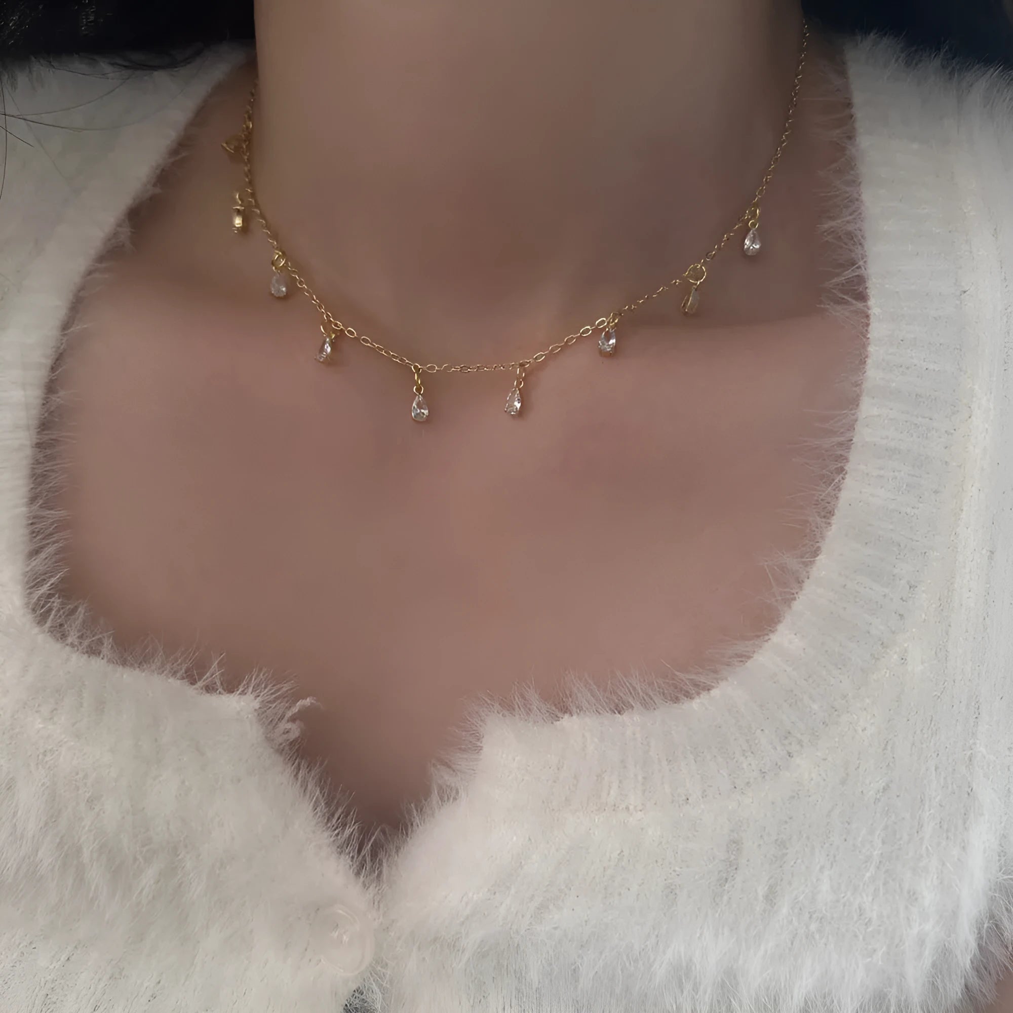 Women's zircon jewellery set showing necklace, earrings, and anklet with geometric meteor shower design