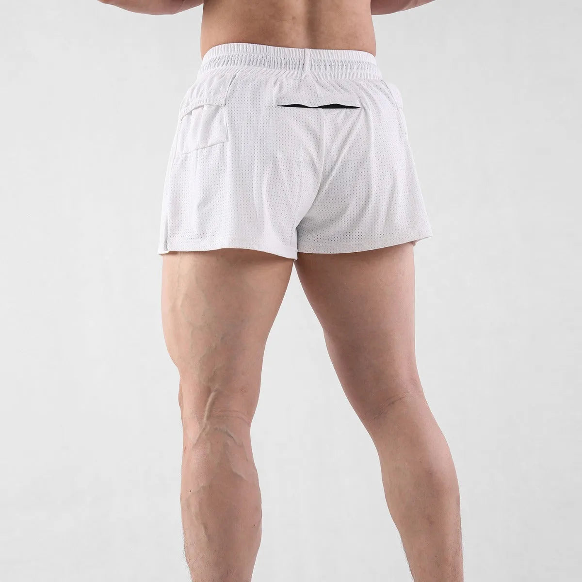 Men's black and white quick-dry nylon summer shorts on a size chart showing options from M to XXXL