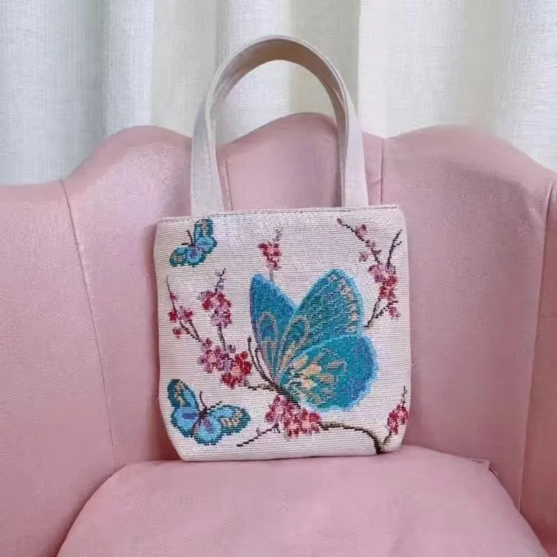 Double-sided gold wire embroidered canvas tote bag in botanical design with polyester construction