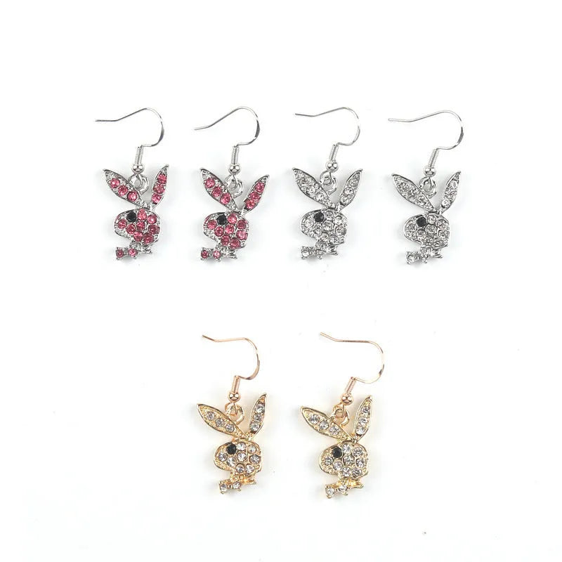 Cute cartoon rabbit stud earrings in silver, pink, or gold colour on alloy posts.