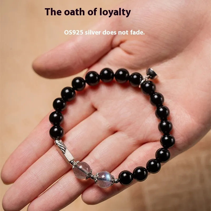 Obsidian Buddha beads couple bracelet set showing 8mm women's and 10mm men's sizing in national style