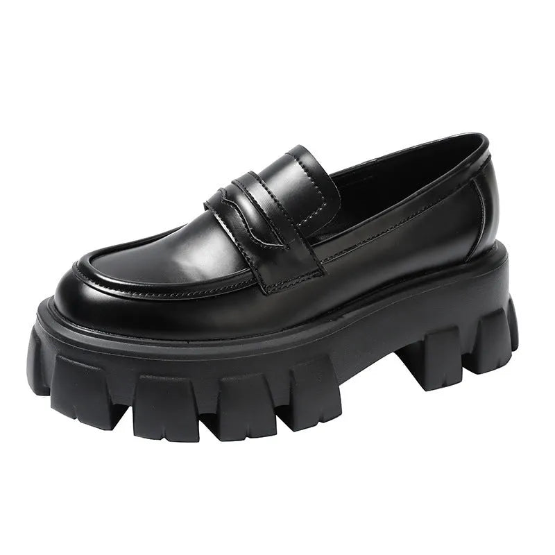 British style wide fit patent leather loafers with a rubber sole and muffin heel, shown in a choice of finishes.
