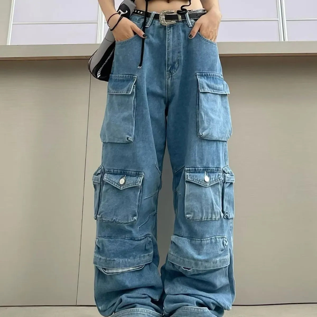 Blue tie-dyed high waist wide leg jeans with multiple pockets and street hipster styling