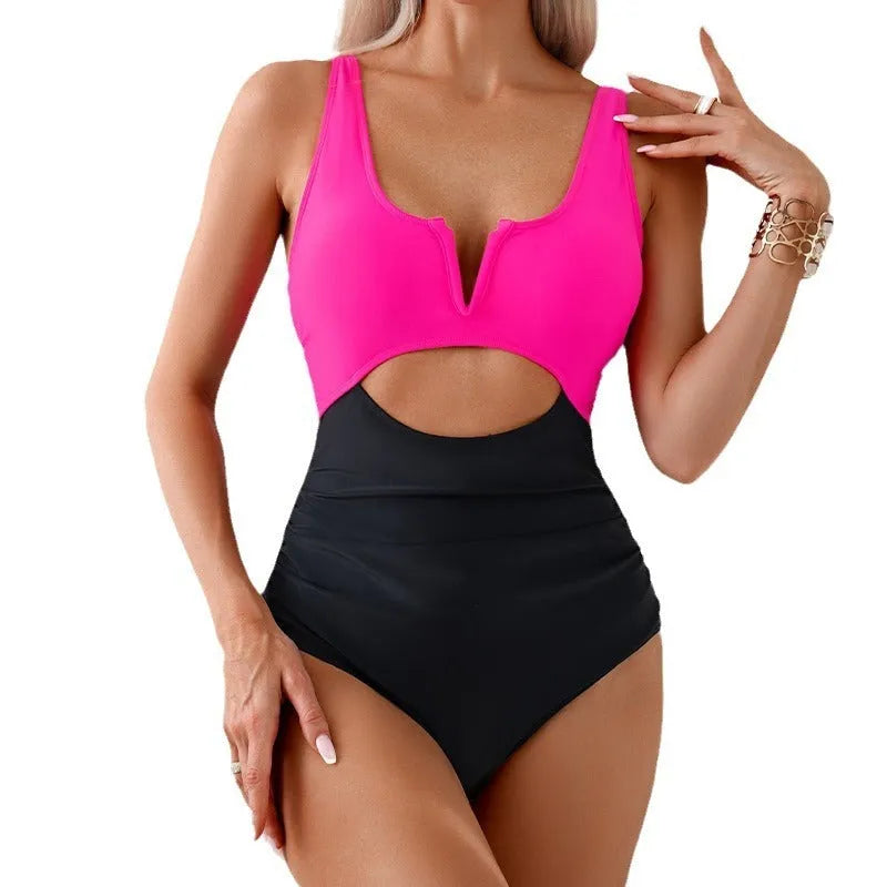 Women's one-piece swimsuit with contrast colour block pattern in nylon fabric.