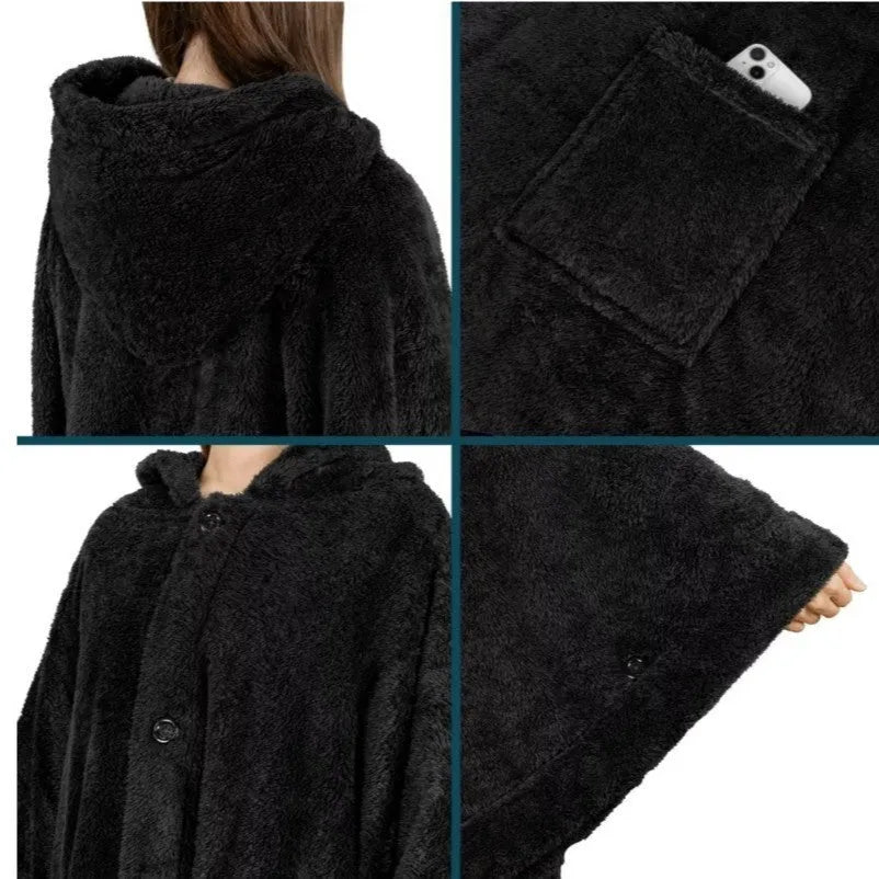 A thick pink hooded cloak bathrobe with long sleeves, shown on a hanger.