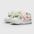 Unisex casual lace-up shoes with thick rubber soles in denim blue colour showing round toe and low-top design