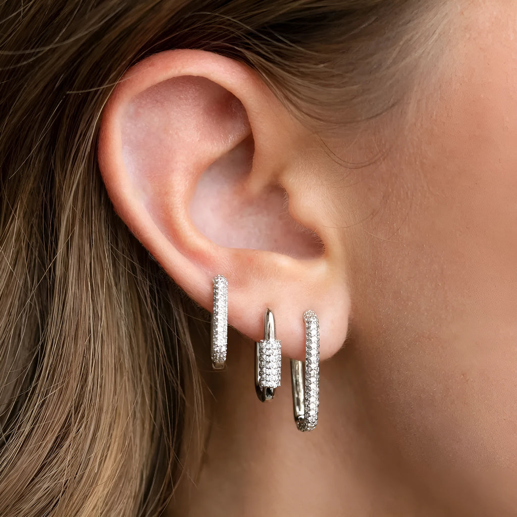 Three geometric ear clips with micro inlaid zircon stones in gold and white colour options