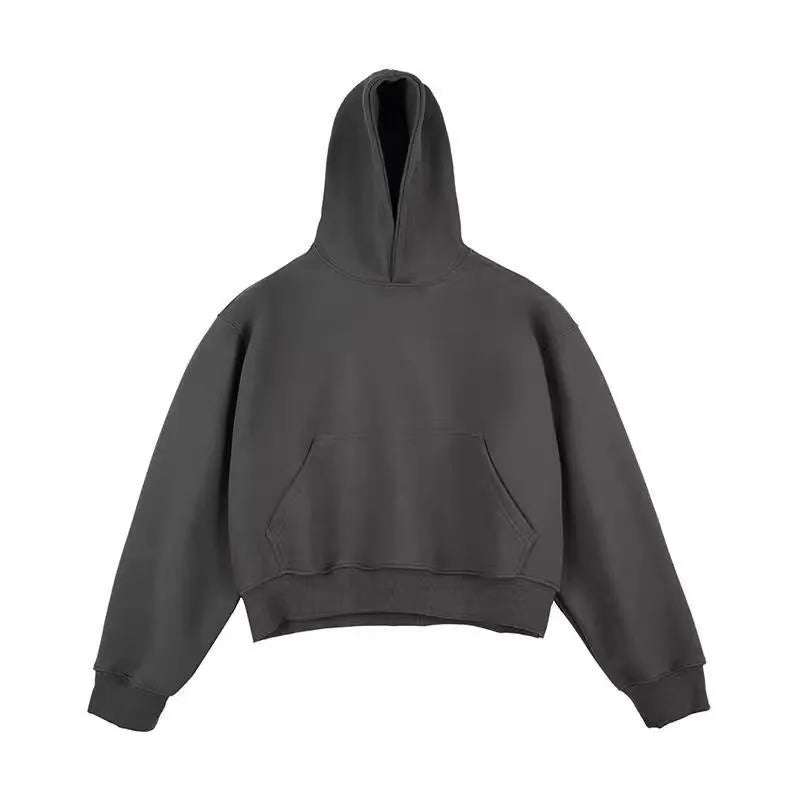 Short dark grey Chinese cotton composite hooded sweater with removable hood and long sleeves on a hanger.