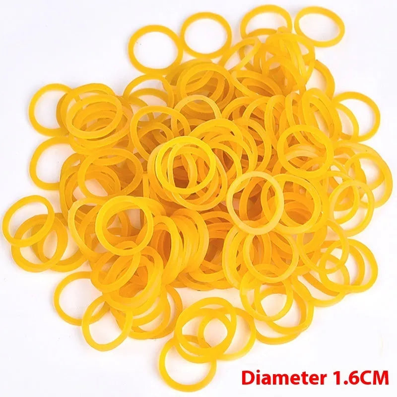 500g bag of yellow rubber bands in multiple sizes from 16mm to 70mm diameter.
