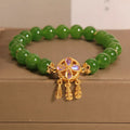 Green jasper crystal four-leaf clover dream catcher pendant on women's adjustable bracelet