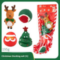 Christmas dog chew toys vinyl gift sets with festive designs including trees, Santa heads, tennis balls and bite ropes