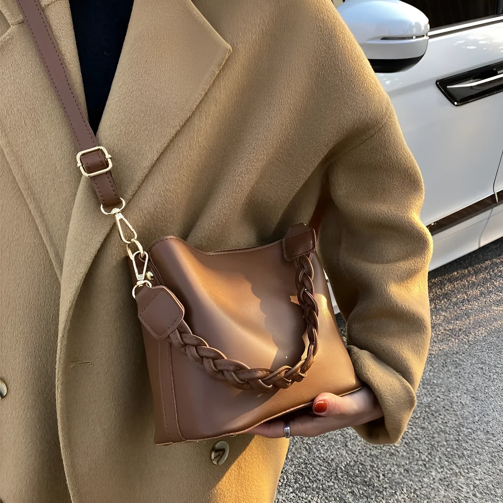 Retro woven PU leather one-shoulder crossbody bucket bag shown in khaki, black, and brown colour options.