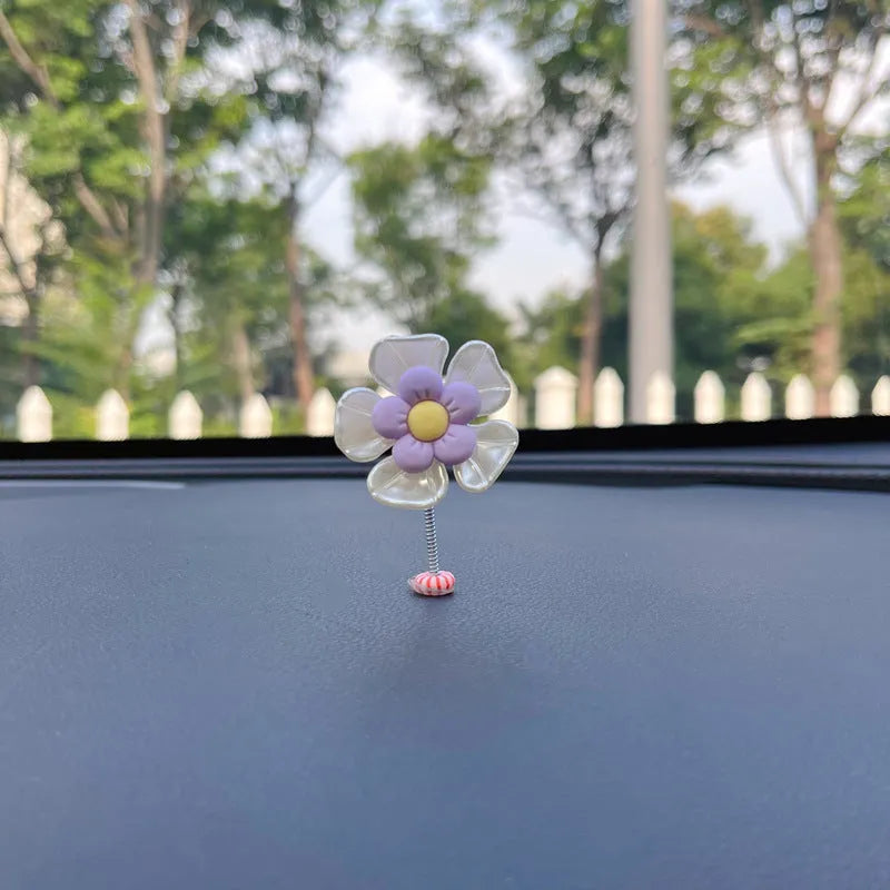 Plastic car decoration ornament with swing design in blue colour showing 5cm height measurement