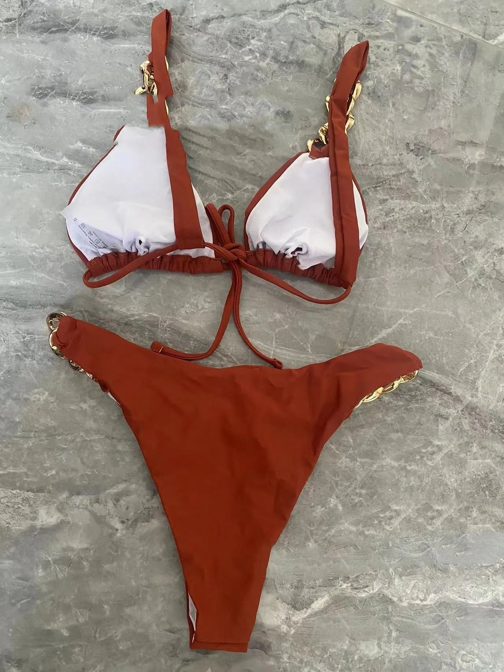 Brown women's push up bikini swimsuit with tube top ring tether and split bottom design