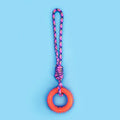 Braided cotton rope dog toy with knotted ends in assorted colours, measuring 43 cm long.