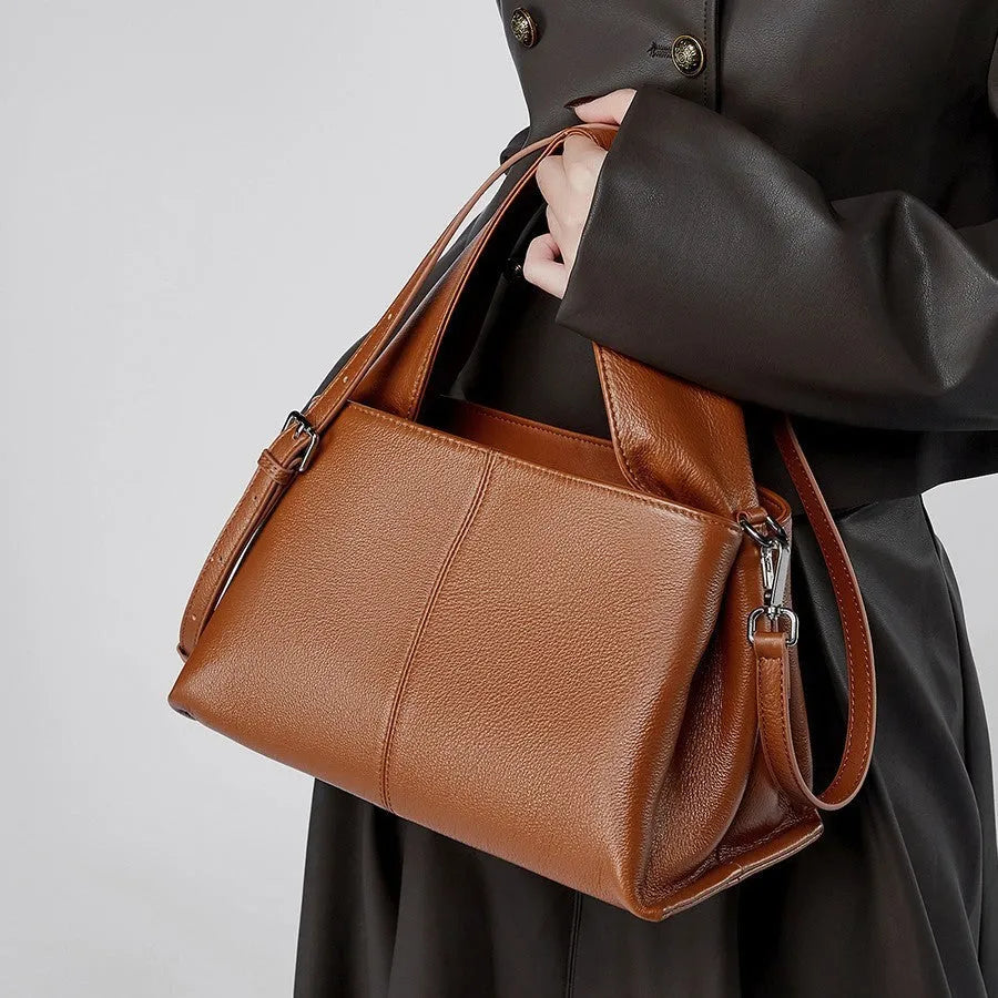 First layer cowhide messenger bag in horizontal square shape with double joint strap and retro texture in solid color