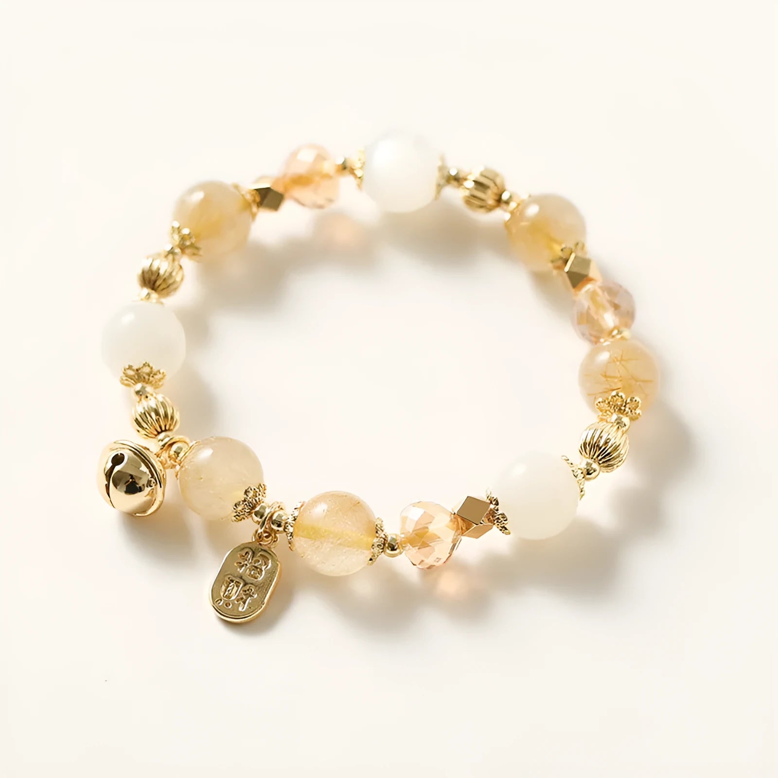 Gold electroplated bracelet with Lucky Fortune gold rutilated quartz crystal and ringing bell in Korean style