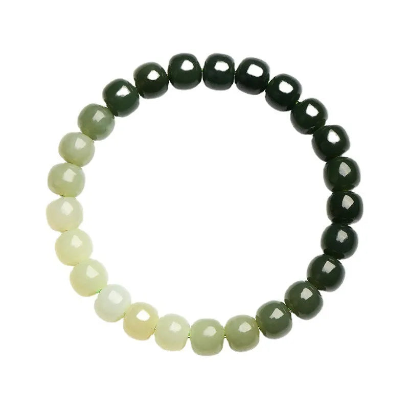 Natural Hetian jade bracelet showing water gradient colour on polished beads