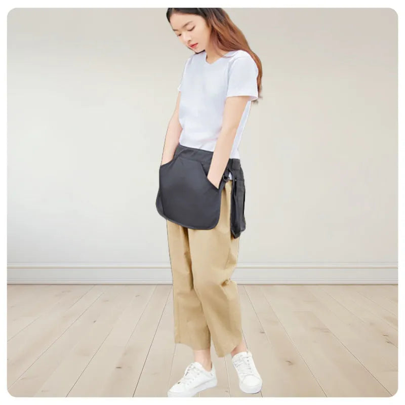 Unisex polyester waist bag with multi-pocket design, adjustable belt, available in black or army green.