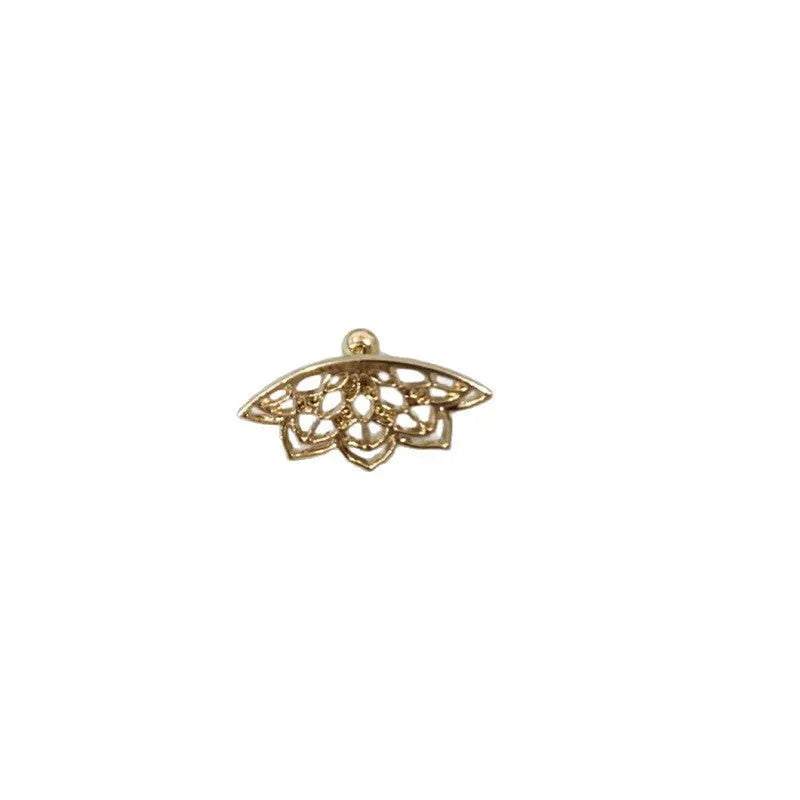 Close-up of metal spider web geometric mesh design stud earrings in a gold electroplated finish.
