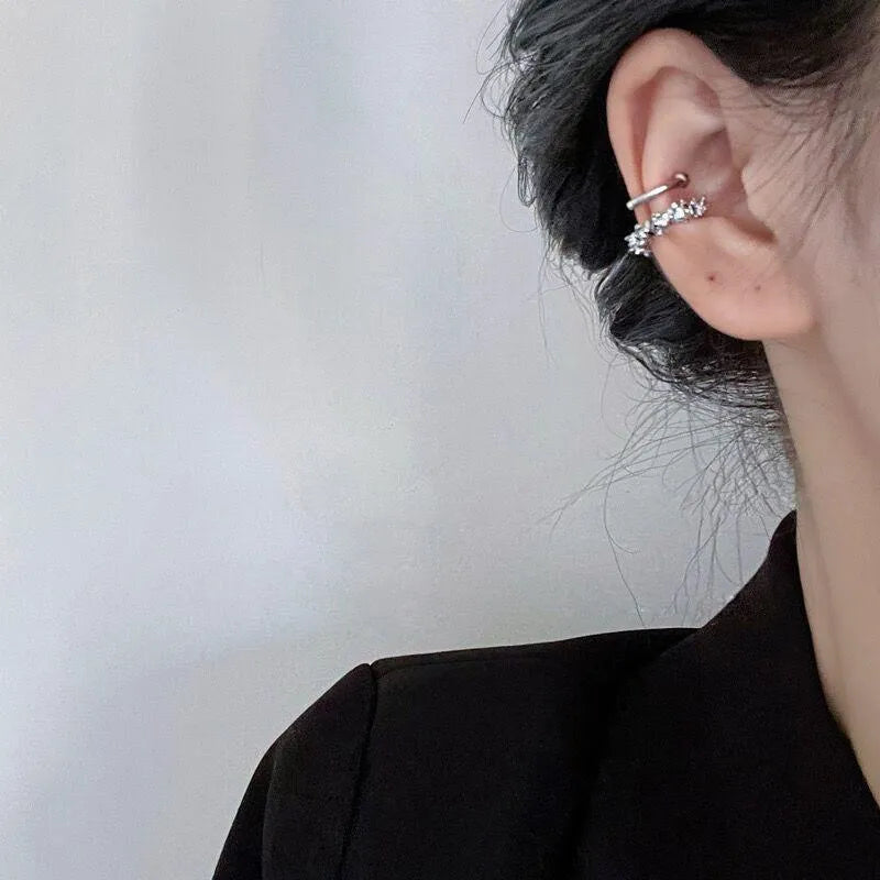 Women's clip-on earrings with irregular geometric shape and frosty finish in alloy