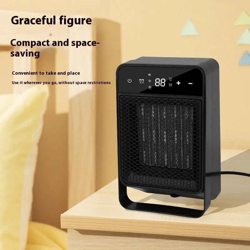 Black desktop electric warm air blower heater with digital touch screen display and remote control on a wooden desk.
