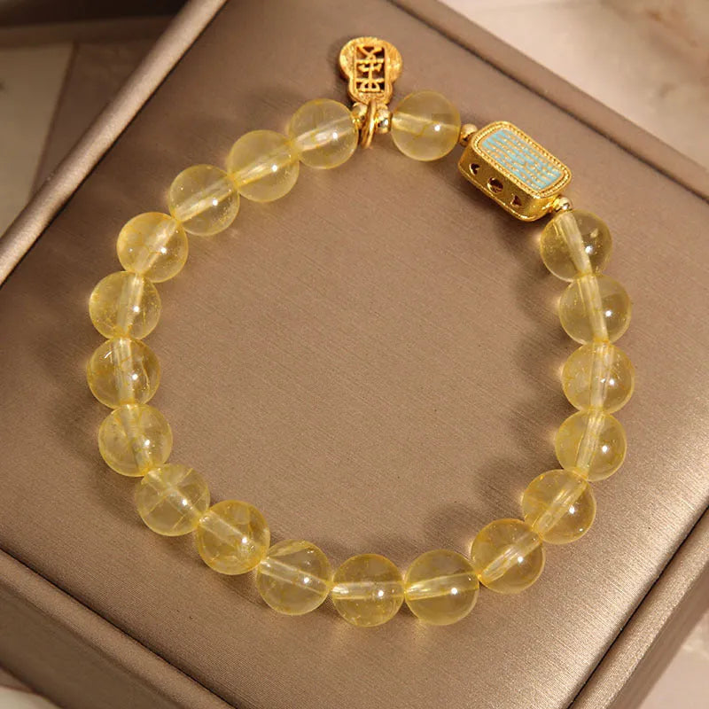 Women's citrine yellow crystal bracelet with rhinestone decorative elements