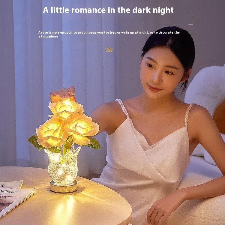 Modern clear crystal flowers USB rechargeable table lamp with touch dimming control on a wooden surface.